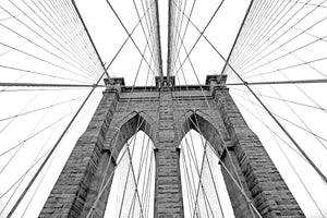 Black and white upward image of Brooklyn Bridge in NYC. Fine Art Photography AHAVART 